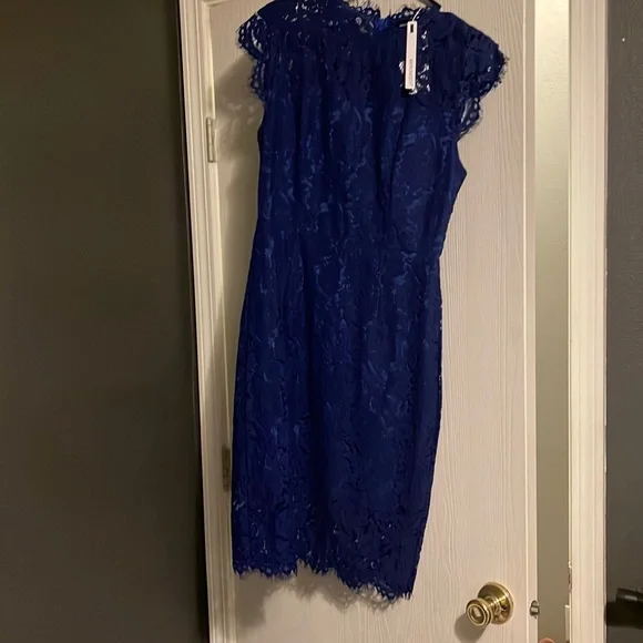 Never worn, knee length, blue lace dress. - Picture 1 of 6